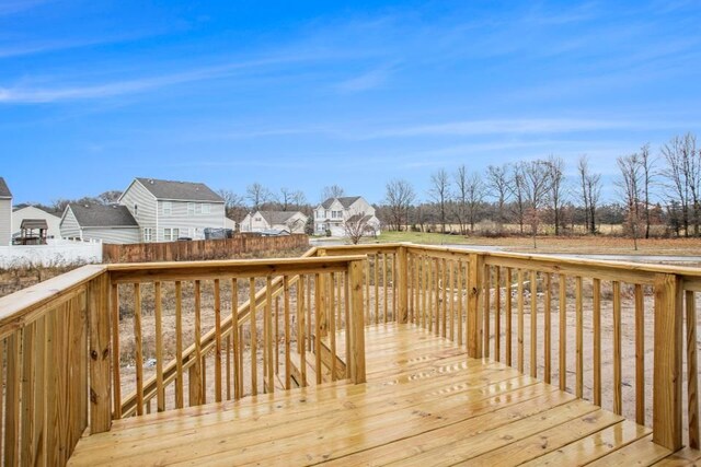 2108 Stillwater Dr, Davison, MI 48423 - wooden deck featuring a residential view