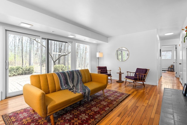 1657 Glenwood Rd, Ann Arbor, MI 48104 - living room featuring hardwood / wood-style floors and baseboards
