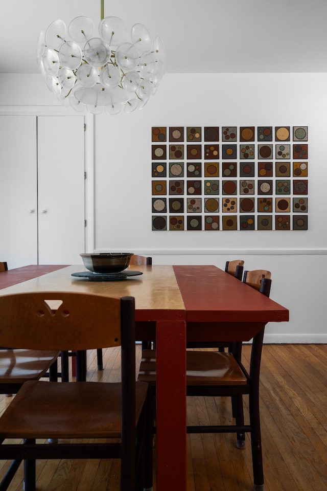 1657 Glenwood Rd, Ann Arbor, MI 48104 - dining area featuring hardwood / wood-style floors and a chandelier