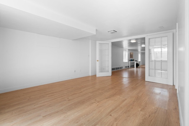 1657 Glenwood Rd, Ann Arbor, MI 48104 - spare room with light wood-type flooring and baseboards