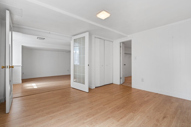 1657 Glenwood Rd, Ann Arbor, MI 48104 - unfurnished bedroom with light wood finished floors and baseboards