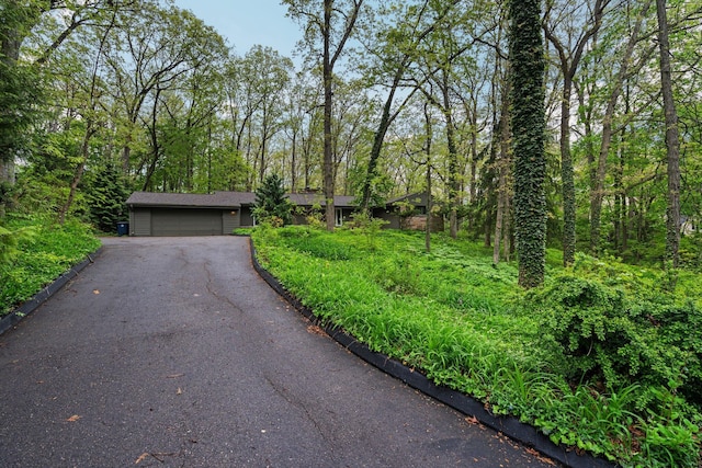 1657 Glenwood Rd, Ann Arbor, MI 48104 - view of front of home with an attached garage and driveway