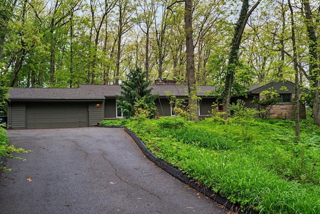 1657 Glenwood Rd, Ann Arbor, MI 48104 - ranch-style home with a garage and driveway