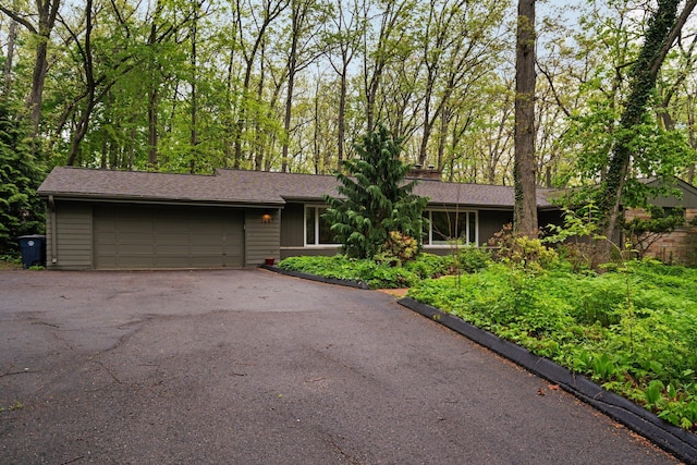 1657 Glenwood Rd, Ann Arbor, MI 48104 - view of front of property with a garage and driveway
