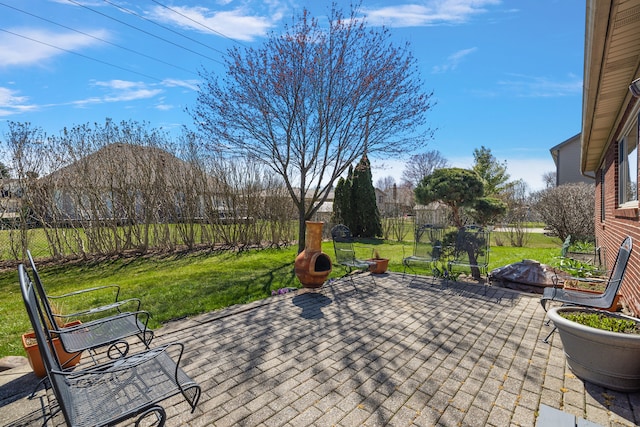 view of patio featuring fence