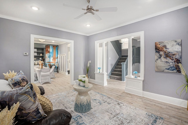 4411 Iroquois St, Detroit, MI 48214 - living area featuring wood finished floors, stairs, baseboards, and ceiling fan