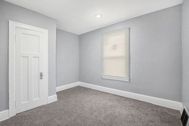 4411 Iroquois St, Detroit, MI 48214 - carpeted empty room featuring baseboards and visible vents