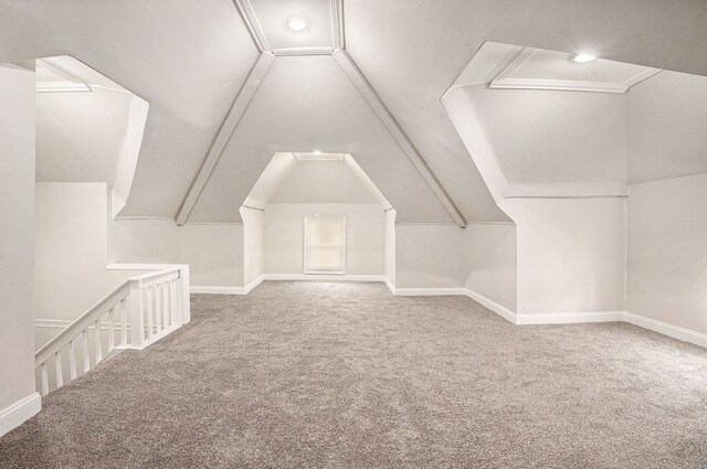 4411 Iroquois St, Detroit, MI 48214 - additional living space featuring lofted ceiling, carpet flooring, and baseboards