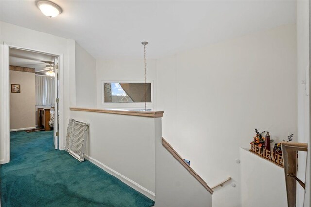 26765 Plumgrove Ln, Farmington Hills, MI 48334 - corridor with baseboards, carpet floors, and an upstairs landing