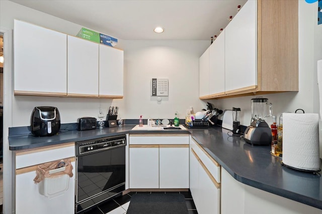 26765 Plumgrove Ln, Farmington Hills, MI 48334 - kitchen with dark countertops, dark tile patterned flooring, dishwasher, white cabinets, and recessed lighting