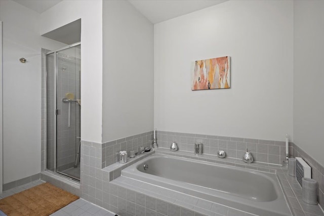 26765 Plumgrove Ln, Farmington Hills, MI 48334 - bathroom with a shower stall, a garden tub, and tile patterned floors