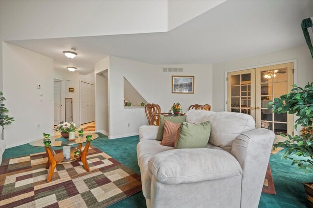 26765 Plumgrove Ln, Farmington Hills, MI 48334 - living area featuring baseboards, visible vents, and carpet floors