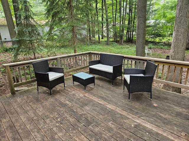 608 Terrace Dr, Houghton Lake, MI 48629 - wooden terrace featuring outdoor lounge area