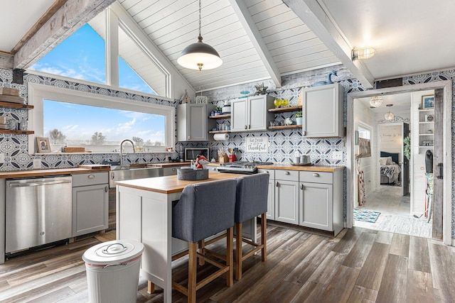 17570 Apache Trl, Howard City, MI 49329 - kitchen featuring stainless steel appliances, a sink, wood finished floors, open shelves, and wood counters