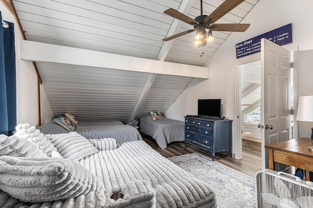17570 Apache Trl, Howard City, MI 49329 - bedroom with ceiling fan, vaulted ceiling with beams, wood finished floors, and wooden ceiling