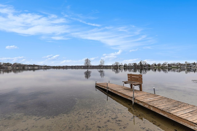 17570 Apache Trl, Howard City, MI 49329 - view of dock with a water view