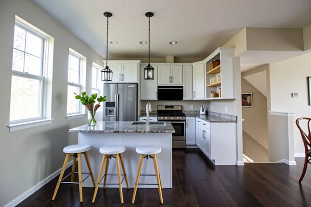 kitchen with white cabinets, dark wood-style flooring, baseboards, open shelves, and appliances with stainless steel finishes