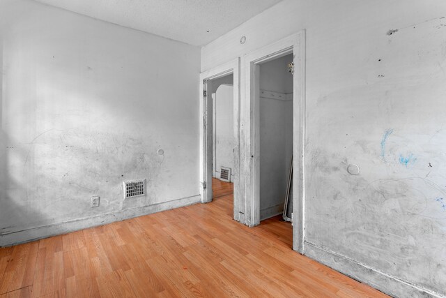 14919 Lesure St, Detroit, MI 48227 - unfurnished bedroom featuring light wood finished floors and a closet