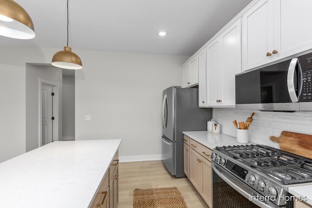 15748 Norwalk Rd, Grand Haven, MI 49417 - kitchen featuring appliances with stainless steel finishes, backsplash, light wood finished floors, recessed lighting, and baseboards