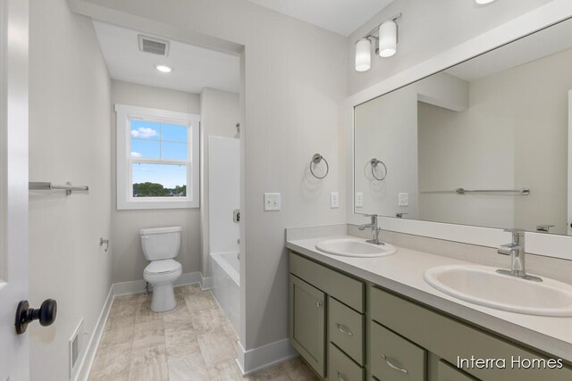 15748 Norwalk Rd, Grand Haven, MI 49417 - full bathroom with double vanity, toilet, baseboards, shower / washtub combination, and marble finish floors