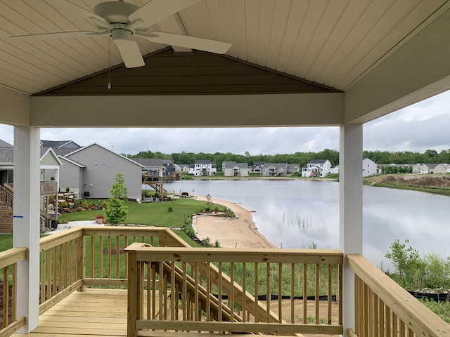 12580 Riverton Rd, Grand Haven, MI 49417 - deck with ceiling fan, a water view, and a residential view