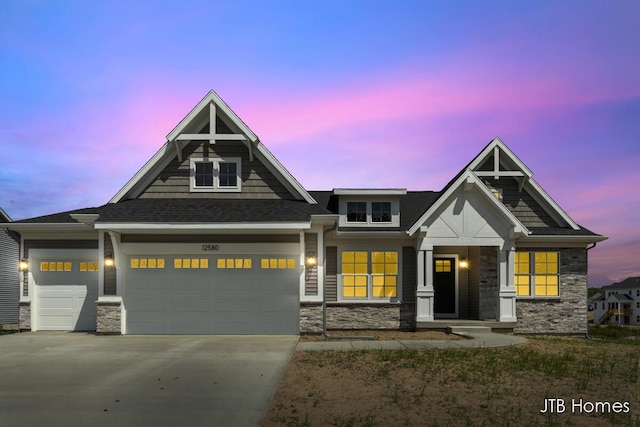 12580 Riverton Rd, Grand Haven, MI 49417 - craftsman house featuring stone siding, driveway, an attached garage, and roof with shingles