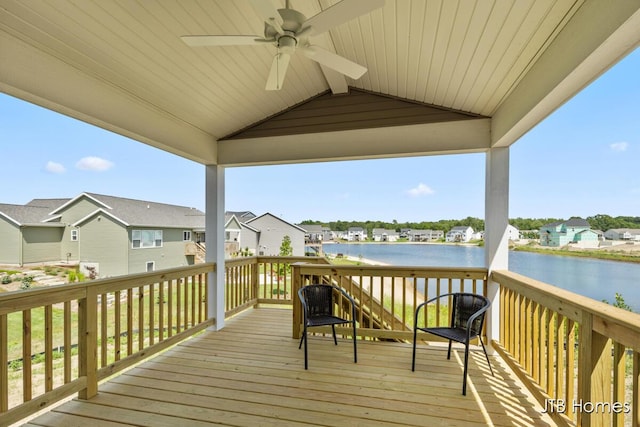 12580 Riverton Rd, Grand Haven, MI 49417 - wooden deck with a residential view, ceiling fan, and a water view