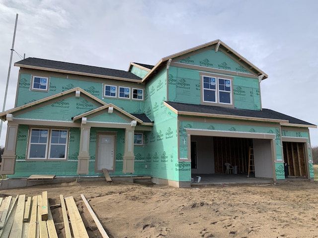 property under construction featuring a garage