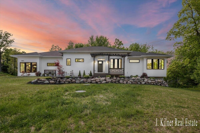 9465 Wabasis Pointe Dr NE, Greenville, MI 48838 - view of front of property with a front yard