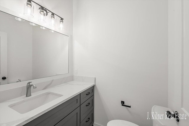 9465 Wabasis Pointe Dr NE, Greenville, MI 48838 - half bathroom with toilet and vanity