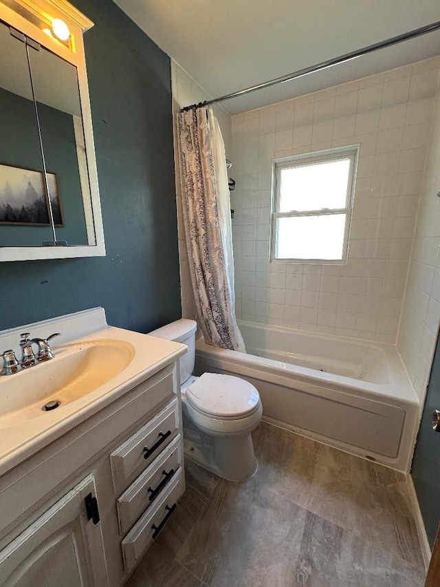 full bathroom with shower / bath combo, vanity, and toilet
