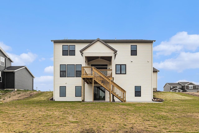 10495 Poppy Ln, Allendale, MI 49401 - back of house with stairway, a yard, and a deck