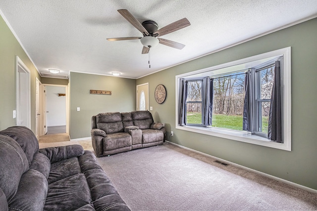 1315 Beaverbrook Dr, Holly, MI 48442 - carpeted living area with baseboards, a ceiling fan, visible vents, and a textured ceiling