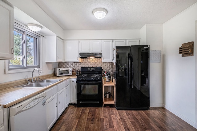 1315 Beaverbrook Dr, Holly, MI 48442 - kitchen featuring a sink, dark wood finished floors, light countertops, under cabinet range hood, and black appliances