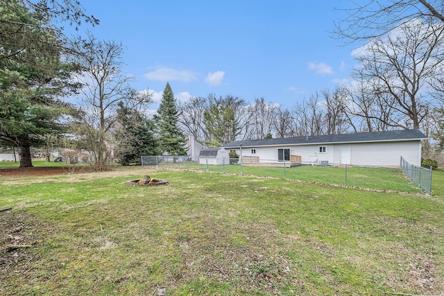 1315 Beaverbrook Dr, Holly, MI 48442 - view of yard with a fire pit and fence