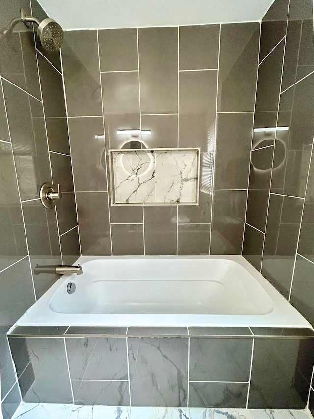 10342 Britain St, Detroit, MI 48224 - bathroom featuring tile walls and tiled shower / bath