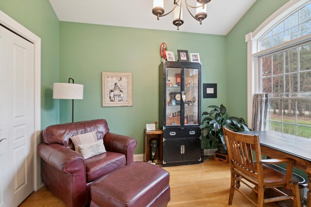 17867 K-Line Way, Marshall, MI 49068 - sitting room featuring a chandelier and light wood-style floors