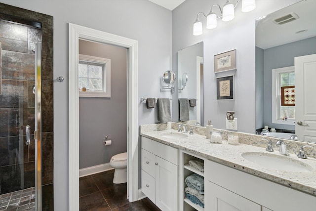 17867 K-Line Way, Marshall, MI 49068 - full bath featuring tile patterned flooring, visible vents, a sink, and toilet