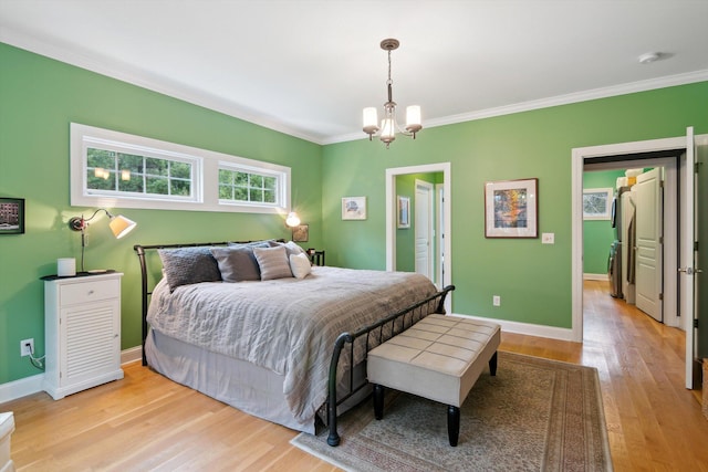 17867 K-Line Way, Marshall, MI 49068 - bedroom with light wood-style flooring, baseboards, a notable chandelier, and ornamental molding