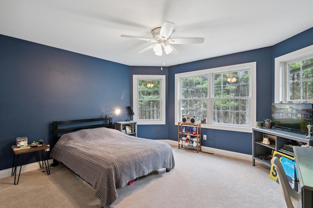 17867 K-Line Way, Marshall, MI 49068 - bedroom with light carpet, a ceiling fan, and baseboards