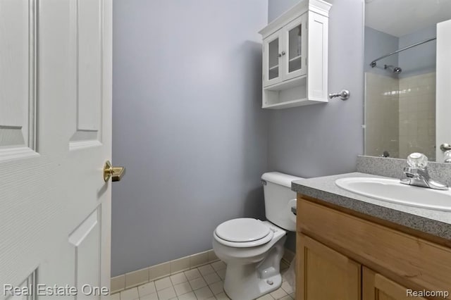 45089 Klingkammer St, Utica, MI 48317 - bathroom with walk in shower, vanity, toilet, tile patterned floors, and baseboards