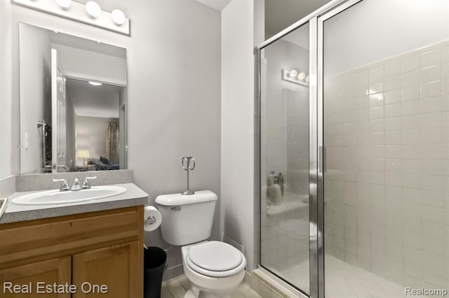 45089 Klingkammer St, Utica, MI 48317 - bathroom featuring vanity, a stall shower, and toilet