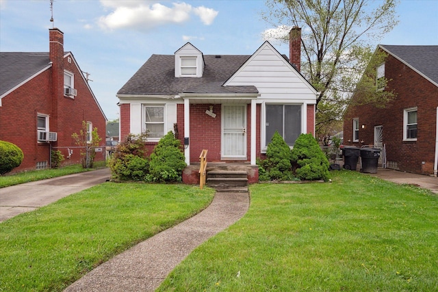 11908 Roxbury St, Detroit, MI 48224 - view of front of home featuring roof with shingles, a front yard, brick siding, and a chimney
