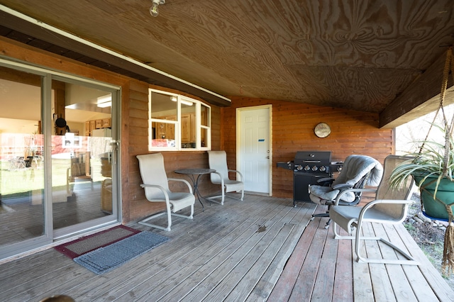 deck featuring a grill