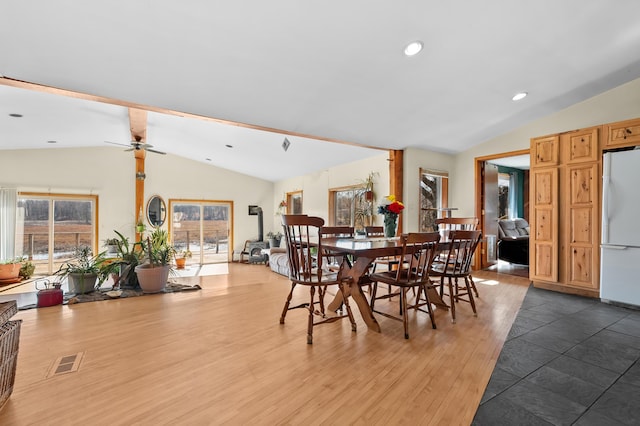 dining room with lofted ceiling with beams, visible vents, recessed lighting, and a healthy amount of sunlight