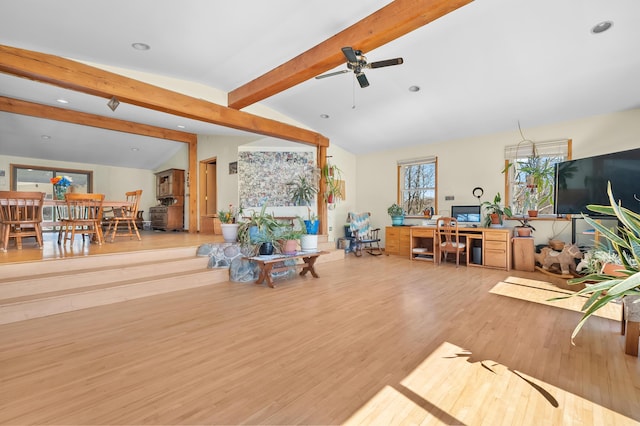 living area featuring recessed lighting, wood finished floors, vaulted ceiling with beams, and a ceiling fan