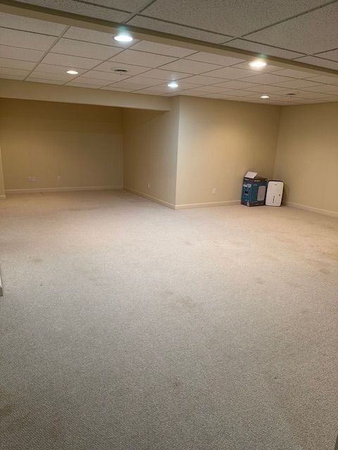 5081 Belmonte Dr, Rochester, MI 48306 - finished below grade area with baseboards, carpet flooring, and recessed lighting