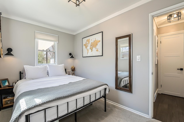 bedroom featuring baseboards and ornamental molding