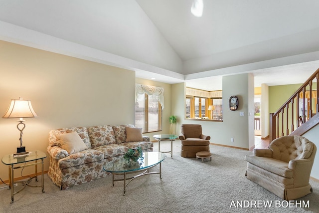 332 Royal Park Dr, Zeeland, MI 49464 - living room featuring lofted ceiling, baseboards, carpet flooring, and stairs
