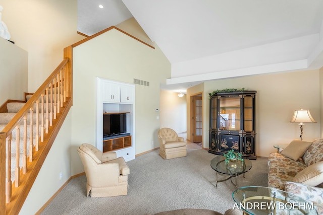 332 Royal Park Dr, Zeeland, MI 49464 - living room with visible vents, high vaulted ceiling, stairs, and carpet flooring